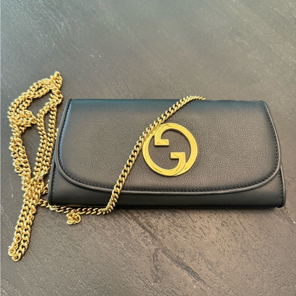 Gucci Black and Gold Leather Clutch with Chain